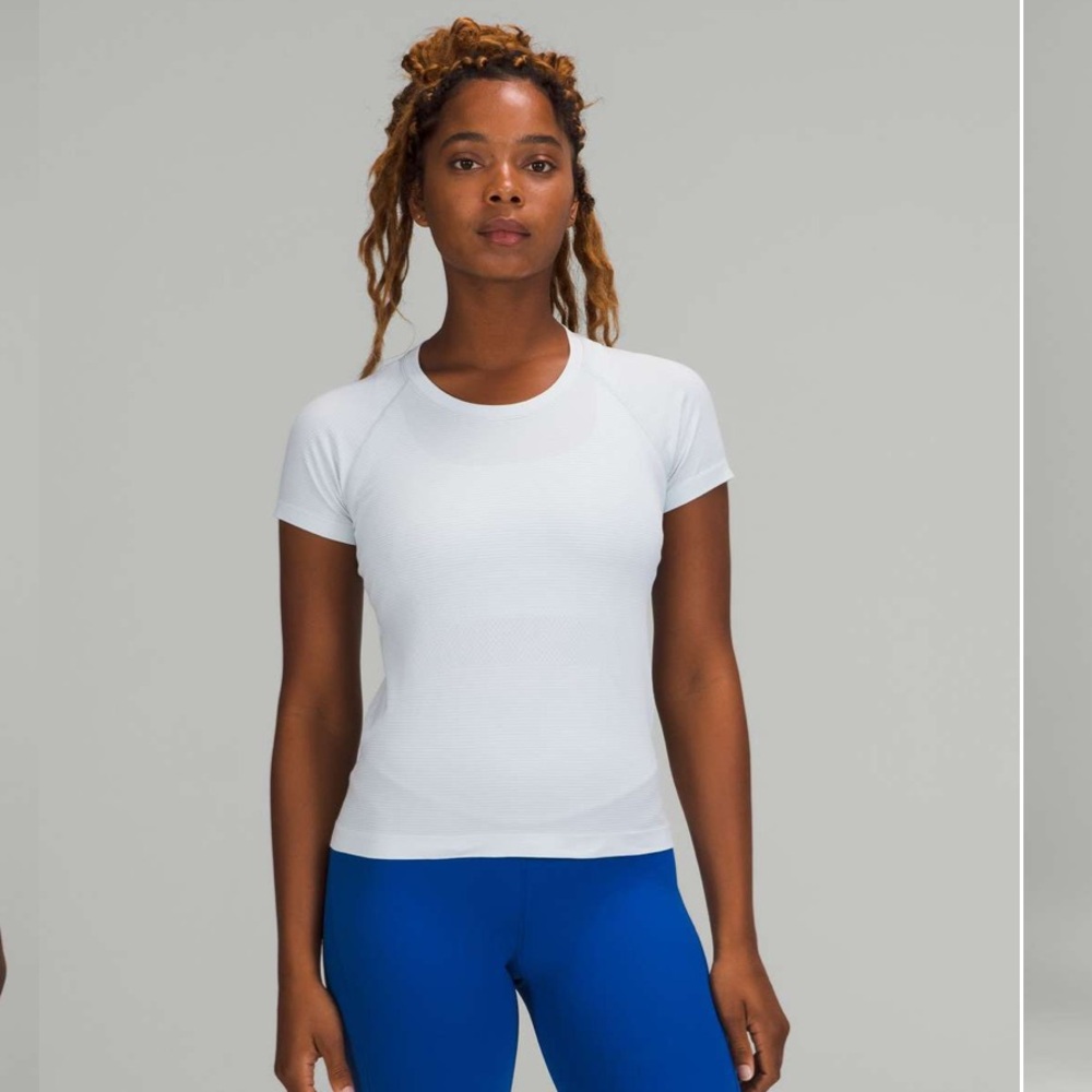 Lululemon- Sz 10- White- Swiftly 2.0 Crop SS Tee- Race Length- “Studio” Logo